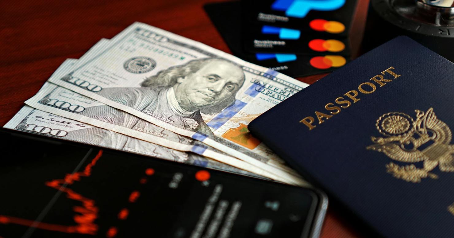 A key labeled TALENT being drawn towards Big Tech, symbolizing the disadvantage startups face due to the H-1B visa fee hike